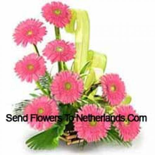  Mand met 9 roze Gerbera's 